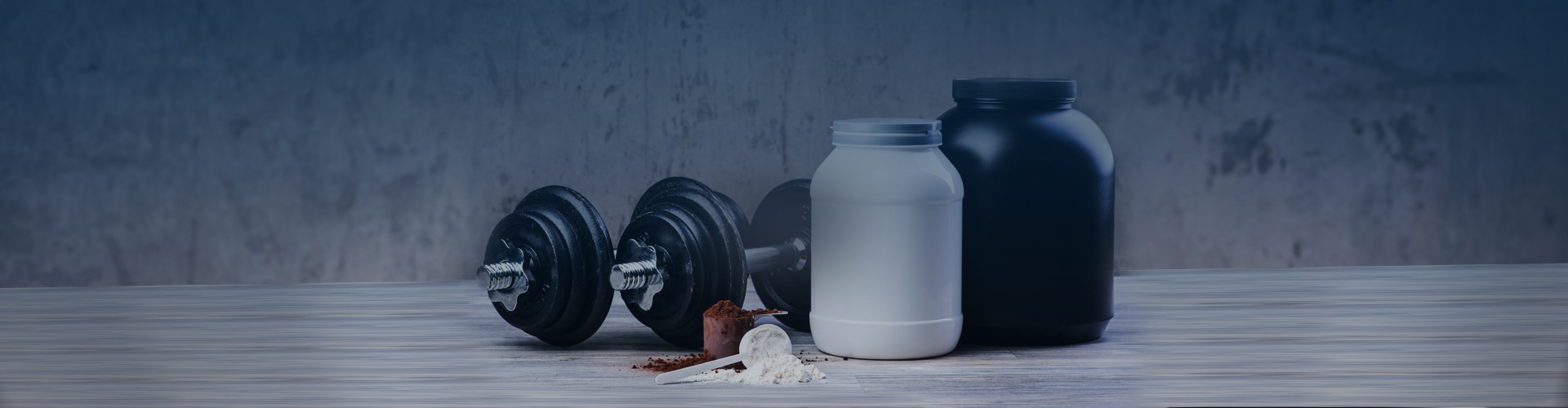 Dumbbells And Jar Of Whey Protein Isolated On White Background